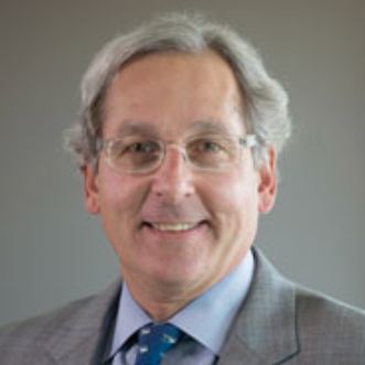 Peter Volanakis headshot — executive portrait.